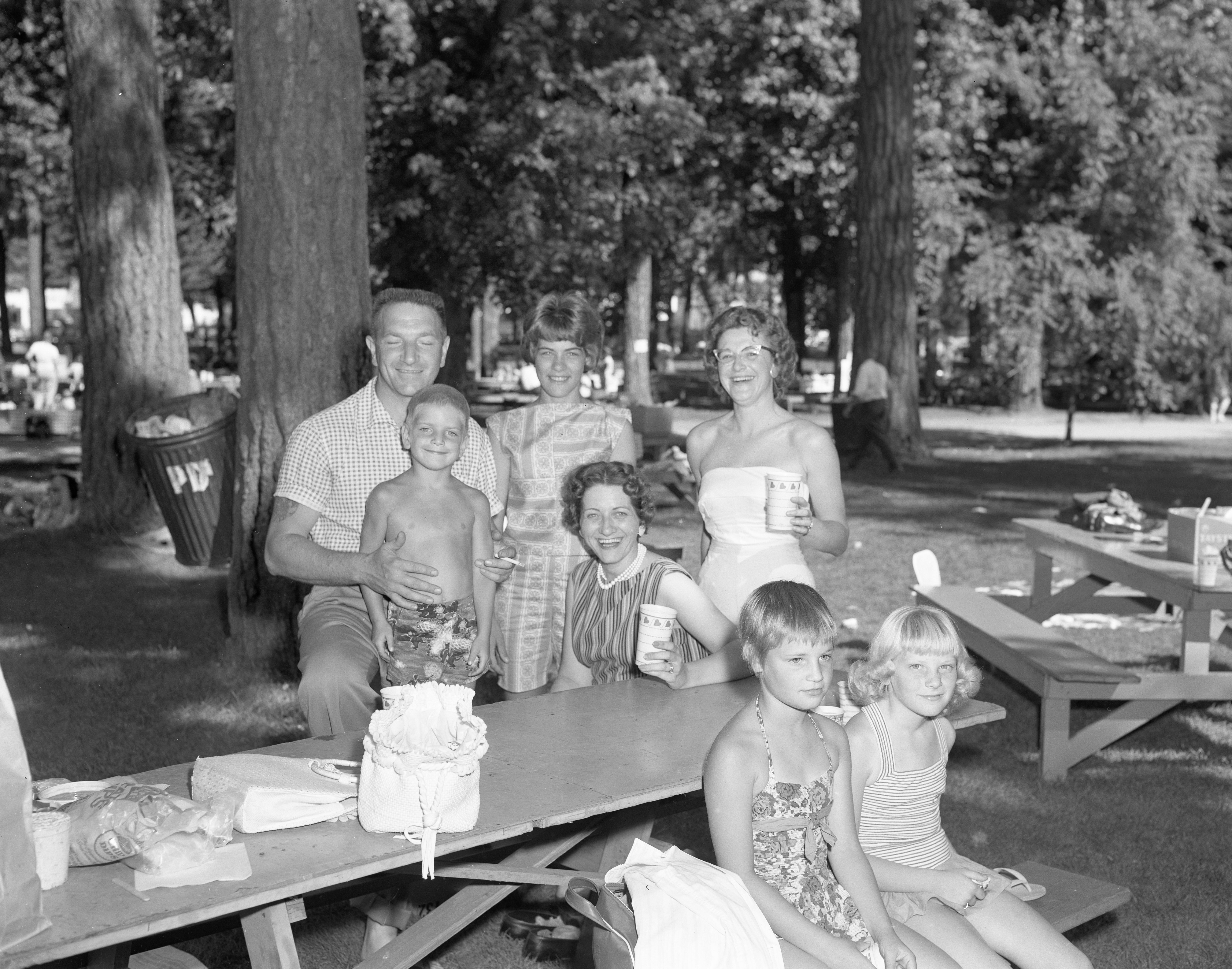 Convair Astronautics employees Betty Schiewe and Jenny Moller with their families.