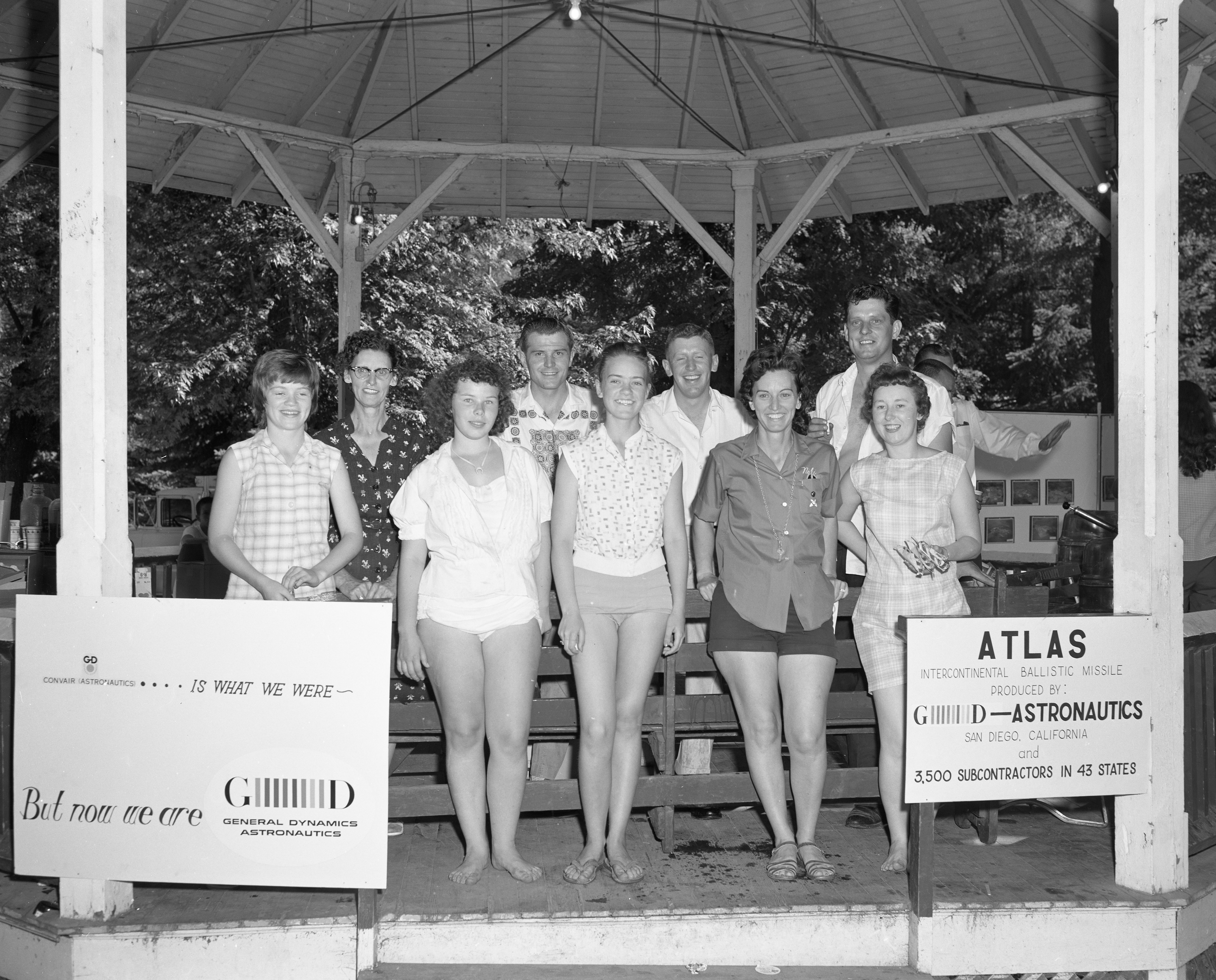 The refreshment committee posing for a photograph under the gazebo.