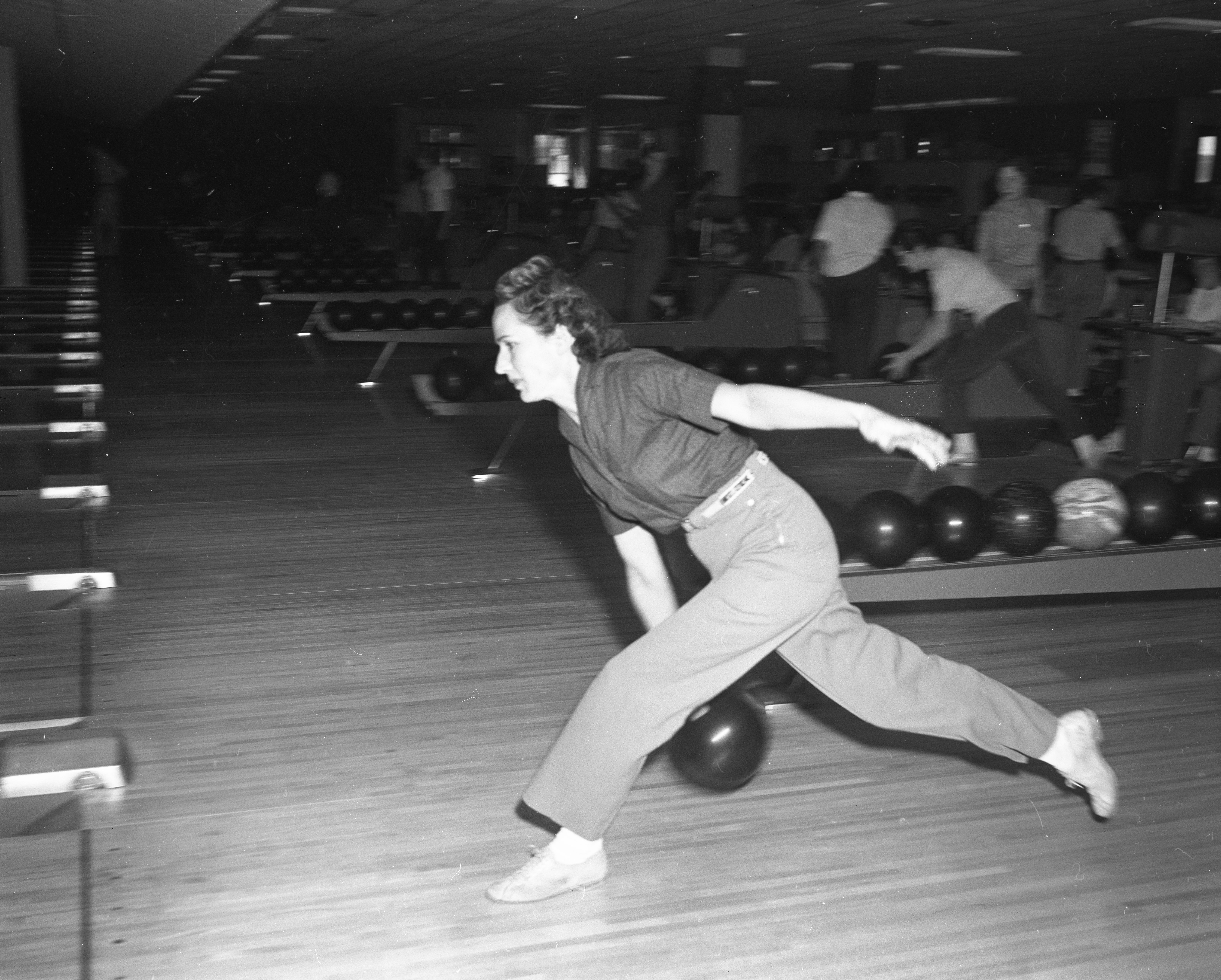 Convair employee in action at the bowling alley.